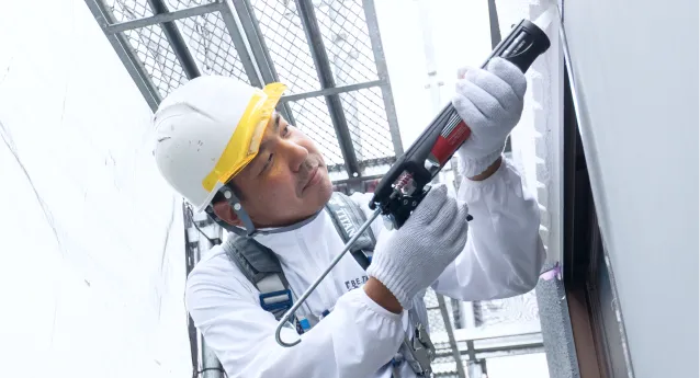 一級塗装技能士が外壁塗装を高品質に施工する技術力を紹介するイメージ